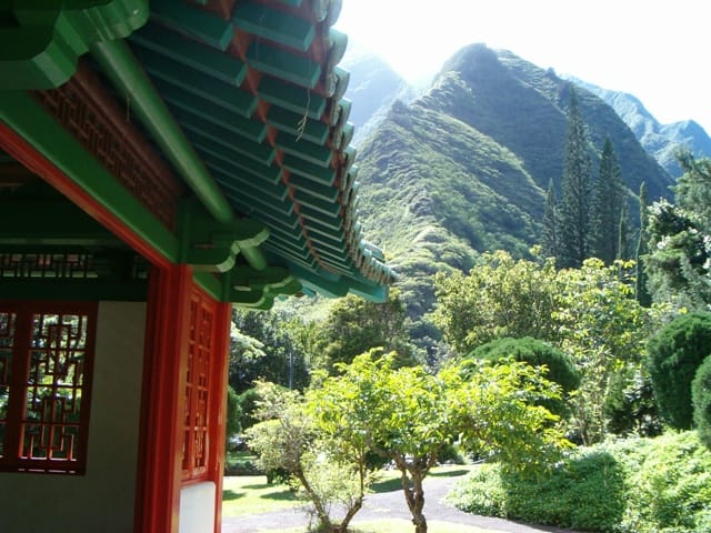 Picture of a Chinese House and Mountains.