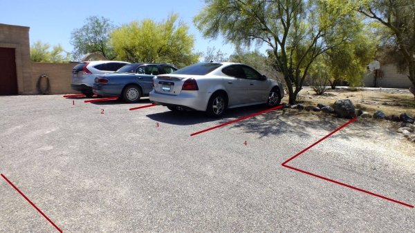 Image of the parking lot at the AHA clinic. 